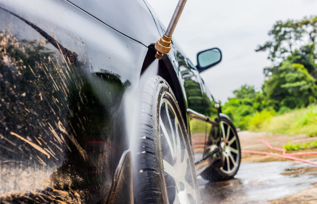 car washing cleaning with foam and hi pressured water